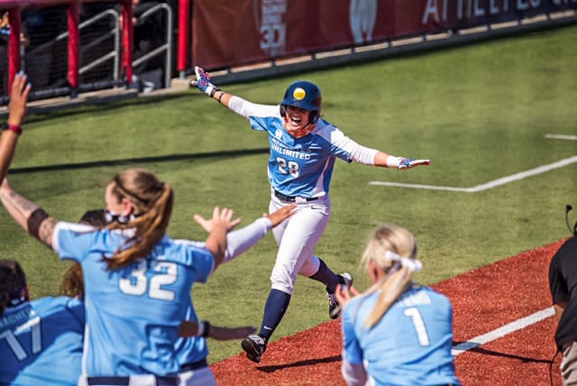 Jessica Warren does a "Blue Angels" celebration heading home.